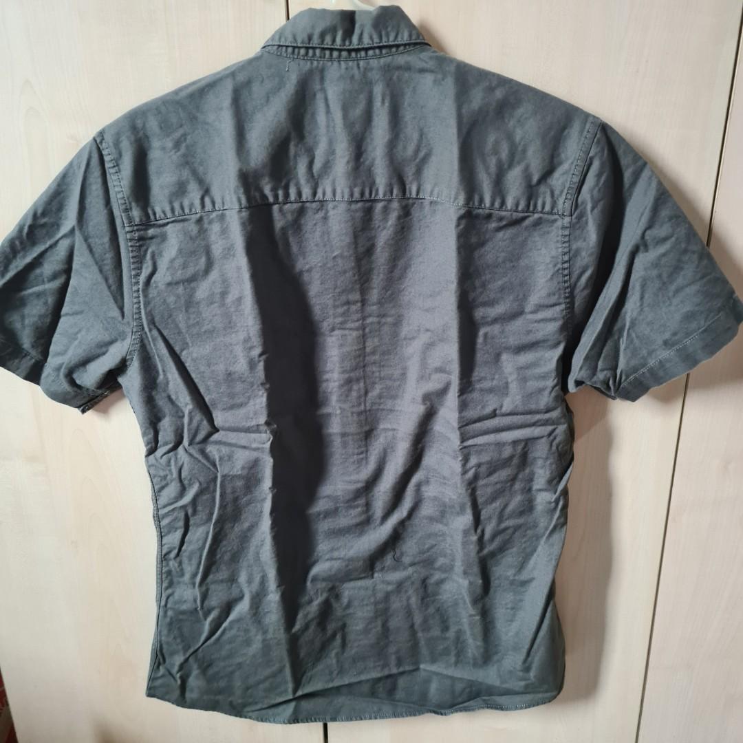 Topman Polo (Category: Formal Shirts) located in Quezon City. Submitted by Strawhat10 (Listing ID 1191551469, Image 2). Description: Topman dark green polo Bought at Topman Trinoma (pre-pandemic) Size: USA Large (slim fit).