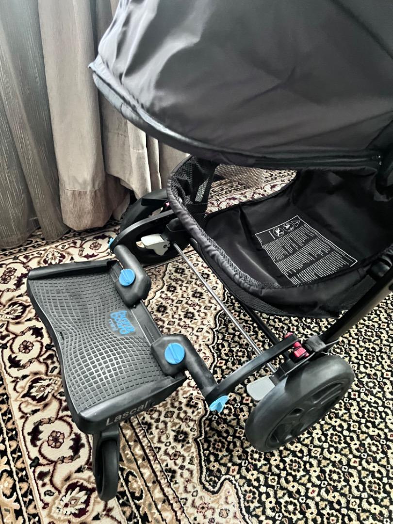 Graco stroller with mini buggy board