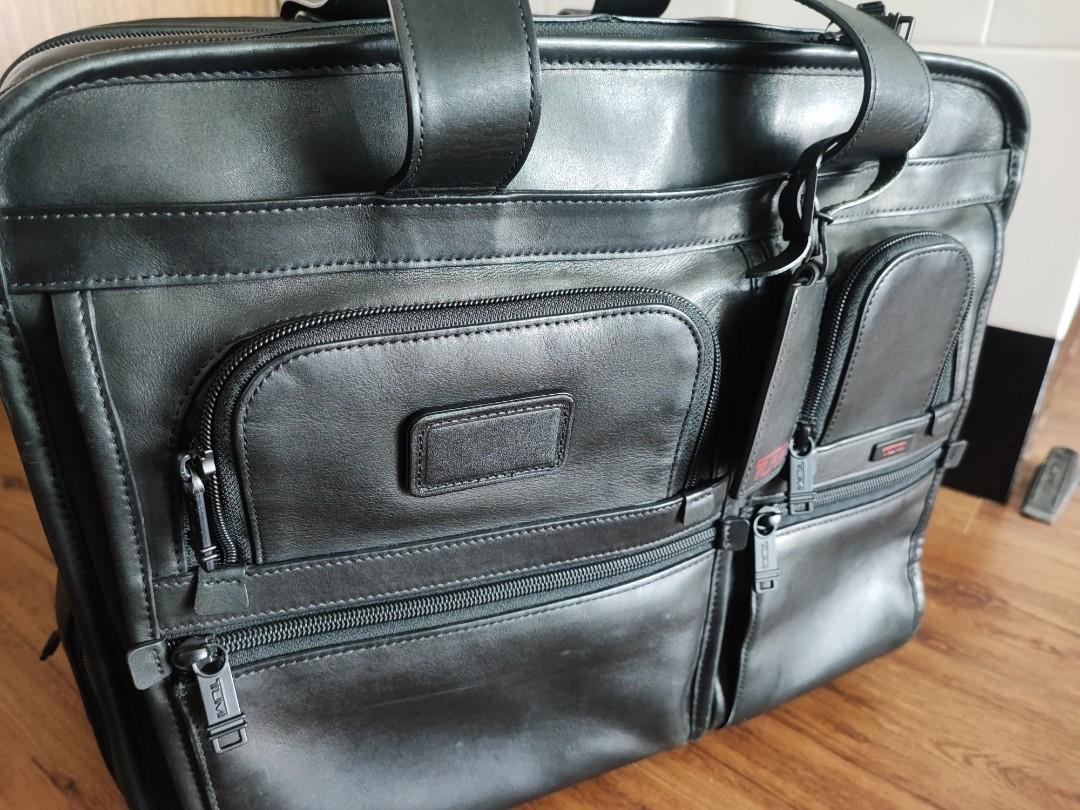 Tumi leather carry on luggage discount