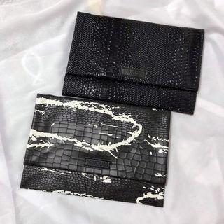 women clutch sling bag