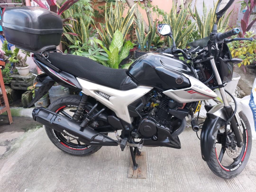 Yamaha SZ-R 150cc (Category: Motorbikes for Sale) located in Pasay City. Submitted by lassaic (Listing ID 1188284673, Image 1). Description: Yamaha SZ-R 150cc (2015-2016) Model: - Price is still Negotiable, drop your offer lang - 2nd Owner, nabili noong January 2020 sa 1st Owner Issue: - ODO and Speedometer not working Recent Upgrade/Palit: - Gulong/Tires - Sprocket - Carburetor (Cleaned) - Clutch Pad - Clutch Lining Inclusions: - Top Bracket & B