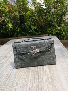 ❌SOLD❌ Hermes Ostrich Kelly Pochette Terre Cuite GHW, Luxury, Bags &  Wallets on Carousell