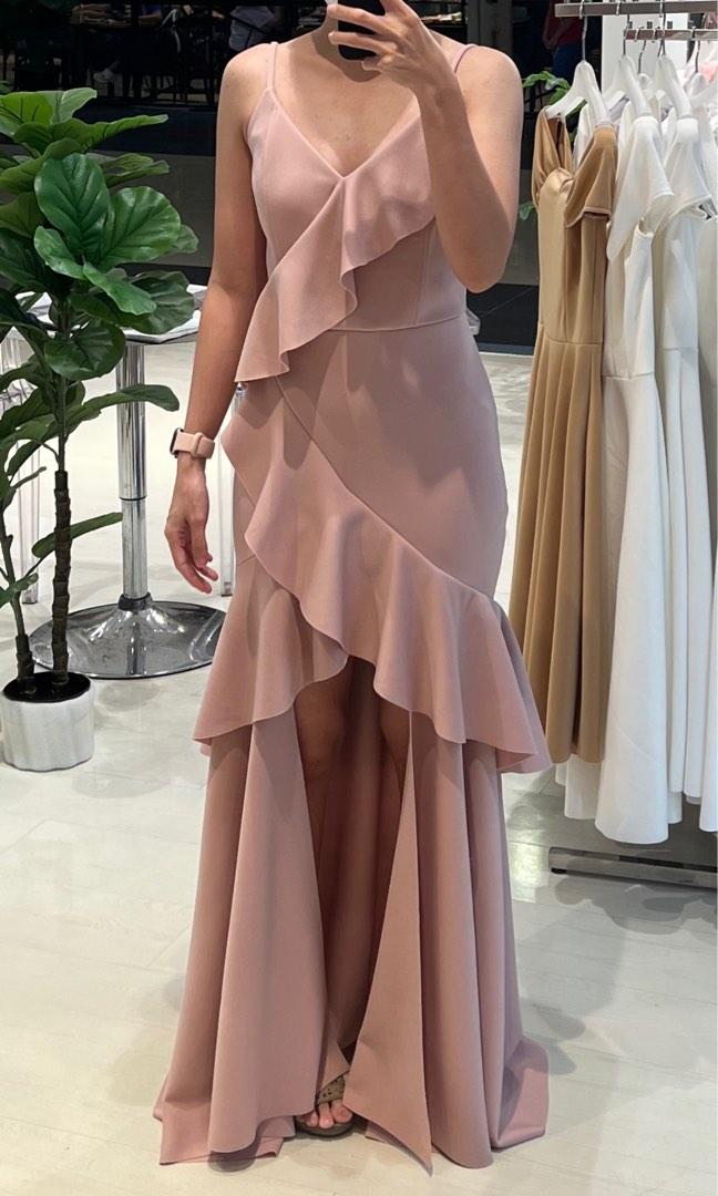 Karimadon Dress (XS) (Category: Evening dresses & gowns) located in Manila. Submitted by bqthings (Listing ID 1191584042, Image 2). Description: - Spaghetti strapped gown with cascading flounce - originally long but excess fabric was cut to make it shorter - excess fabric still intact and may be re-attached as needed - no stains or flaws - used once - good as new Fabric: Neoprene Size: XS Color: Coral Pink.
