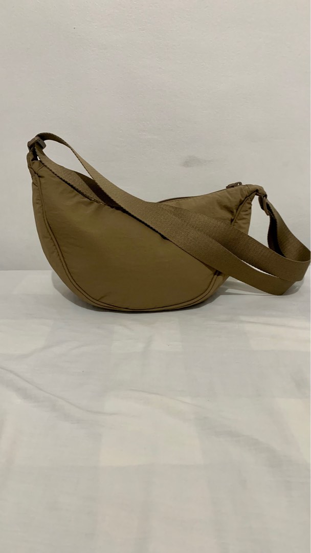 Uniqlo Round Mini Sling Bag, Men's Fashion, Bags, Sling Bags on Carousell