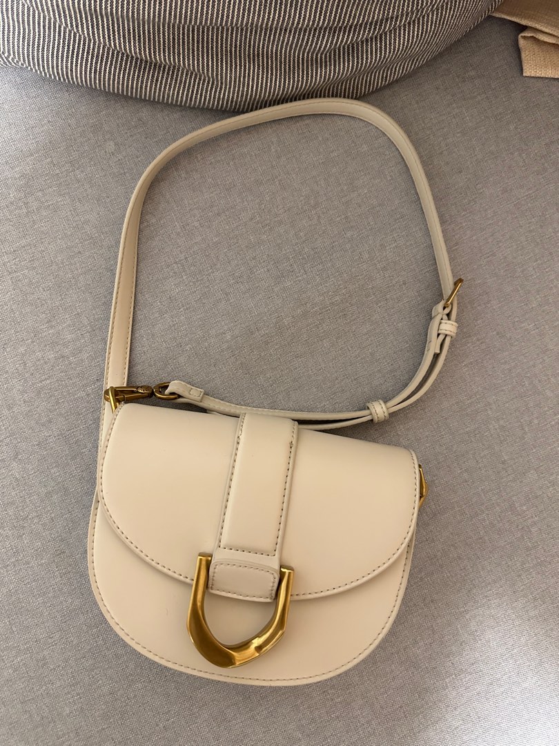 Charles & Keith Mini Gabine Saddle Bag, Women's Fashion, Bags & Wallets