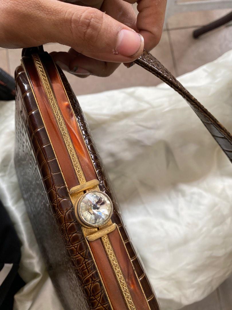 Handbag jenama crocodile store