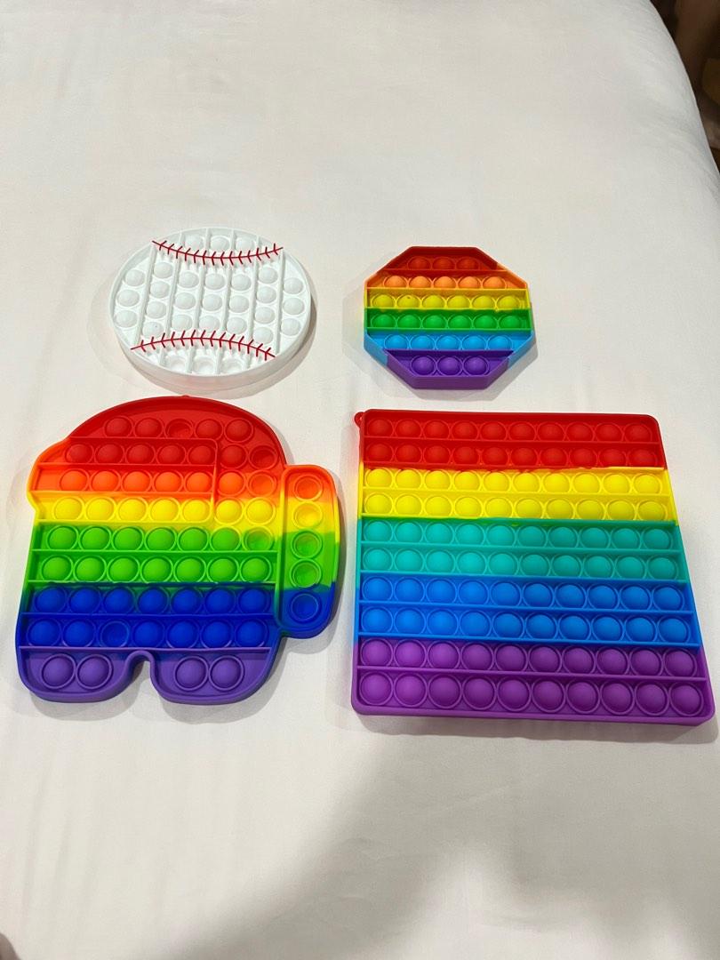 Like new pop it toy for kid (Category: Kids Toys) located in Singapore. Submitted by star83 (Listing ID 1191975750, Image 1). Description: Big one at $7 Small one at $4.