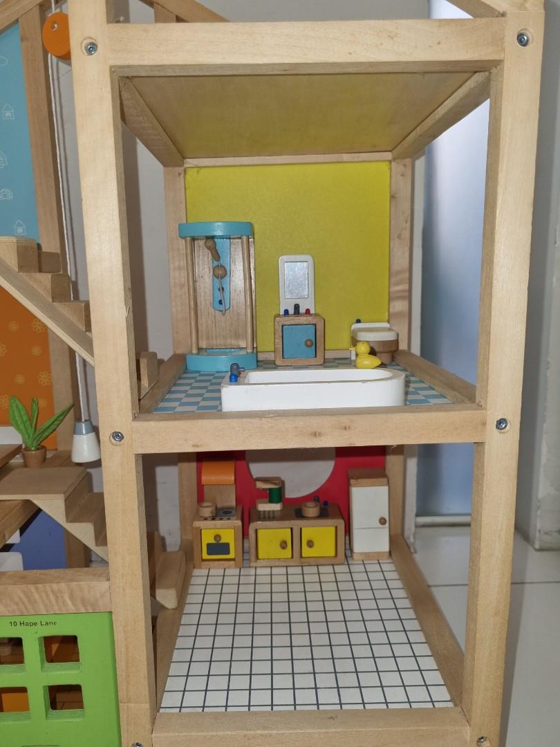 Preloved wooden Hape All Season Dollhouse
