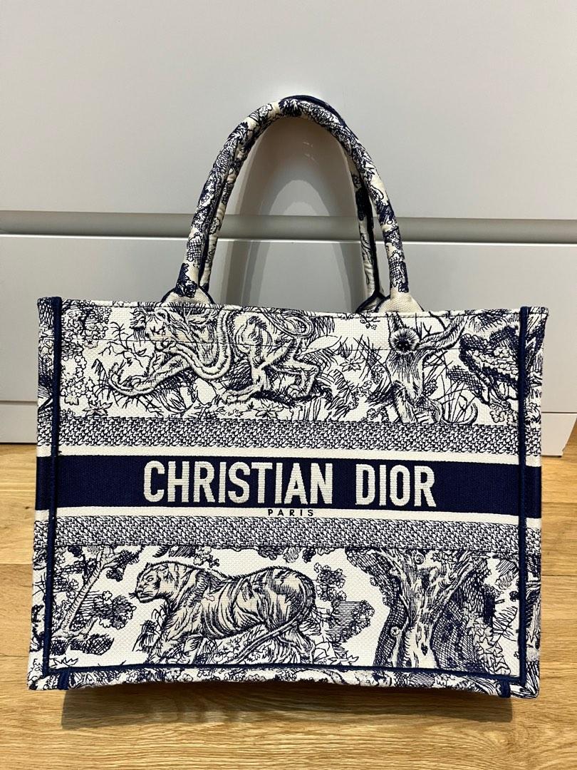 Dior Book Tote Bag Medium (Category: Bags & Wallets) located in Singapore. Submitted by maeganlim84 (Listing ID 1192196229, Image 1). Description: 100% Authentic With Receipt, purchase from MBS Condition 9.5/10.