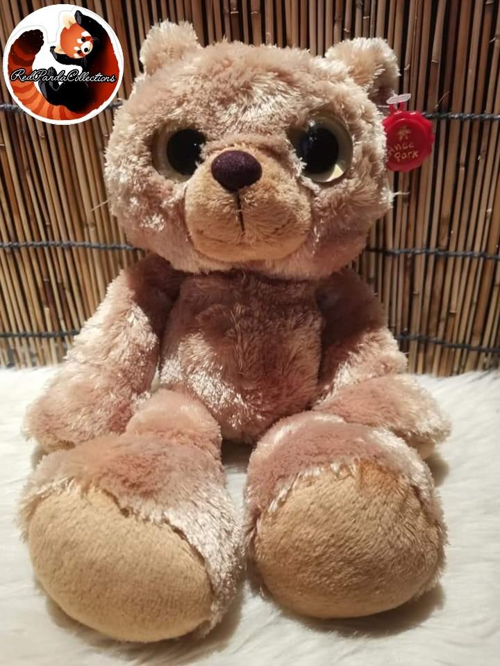 Big eyed teddy bear hot sale