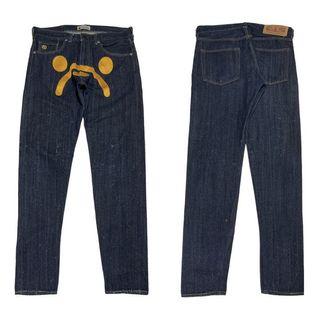 BAPE sad face tattered denim jeans
