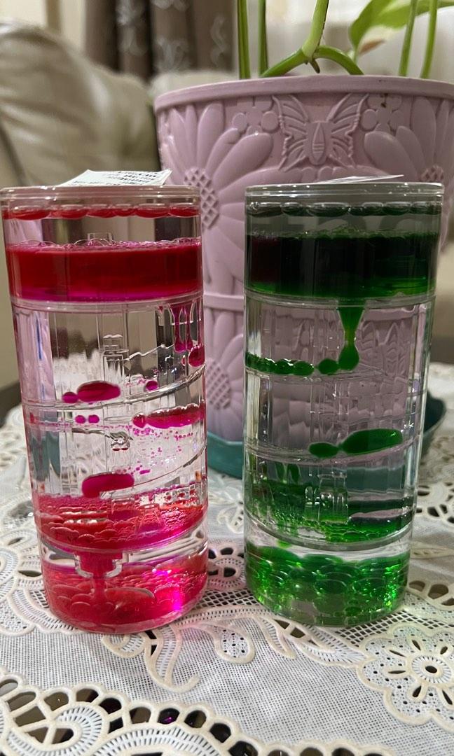 Double/single colors liquid timer-oil hourglass desk decor (Category: Clocks) located in Manila. Submitted by hellokittyjhoe (Listing ID 1192299392, Image 1). Description: 250 each.