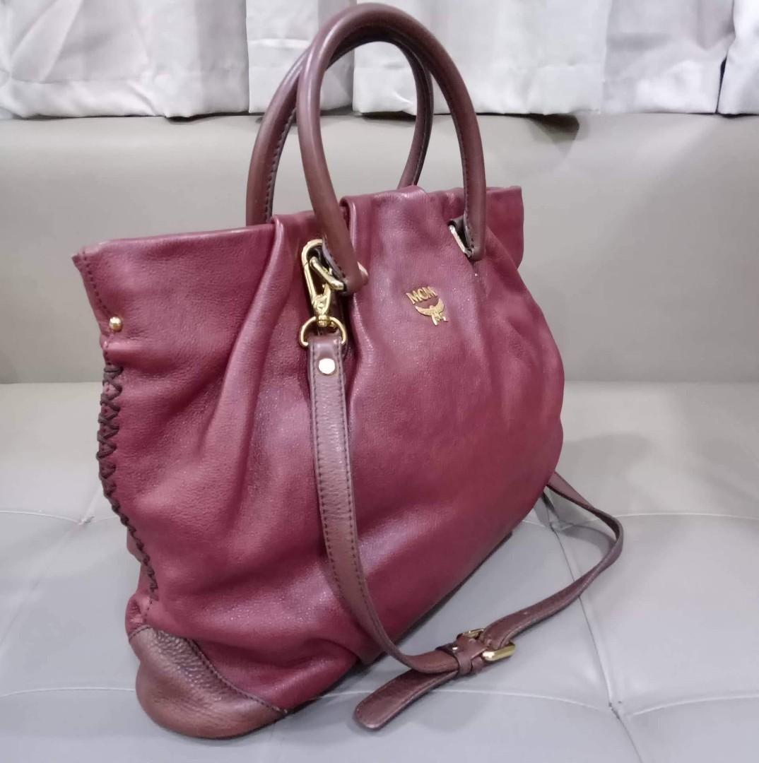 MCM Two Way Tote Bag (Category: Luxury Bags & Wallets) located in Taguig. Submitted by esa.agustin (Listing ID 1192278889, Image 2). Description: Original MCM leather two way bag. With original sling and dust bag. Made in Korea.