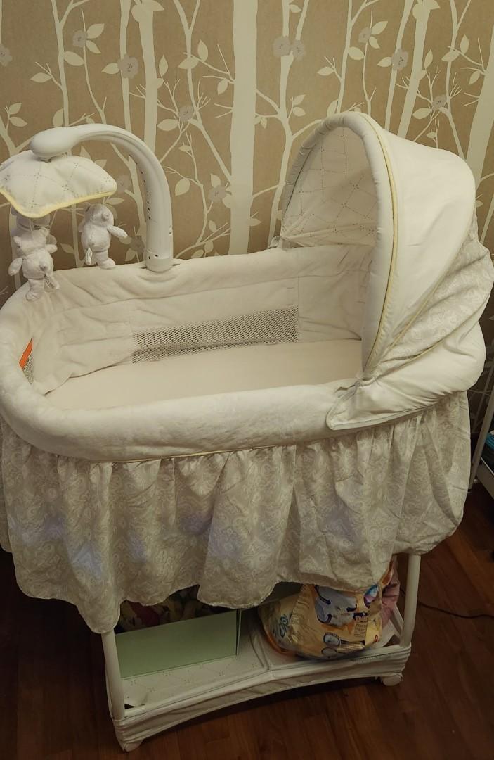 Simmons elite gliding bassinet peacock hot sale