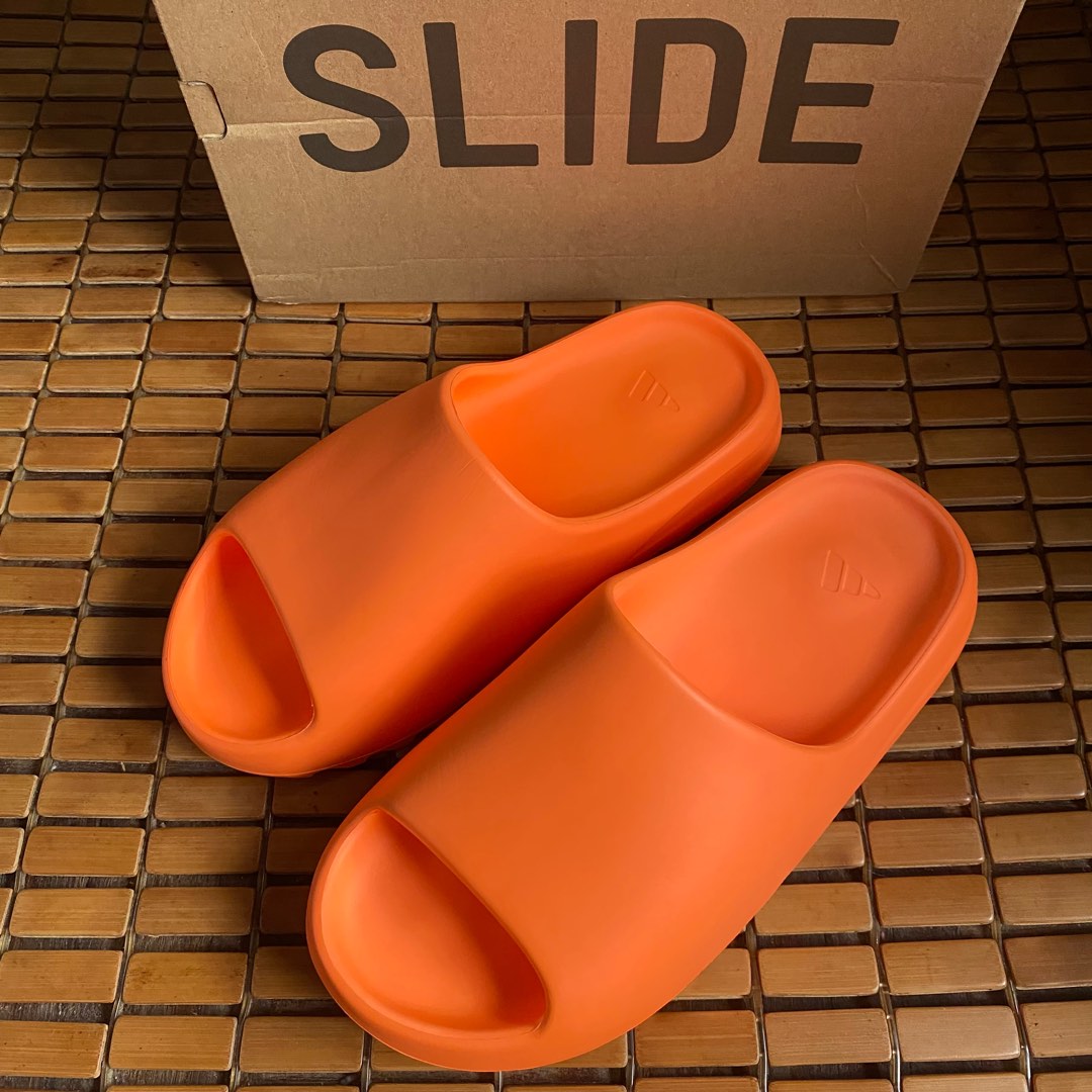 Yeezy Slides Enflame Orange, Men's Fashion, Footwear, Flipflops and Slides  on Carousell