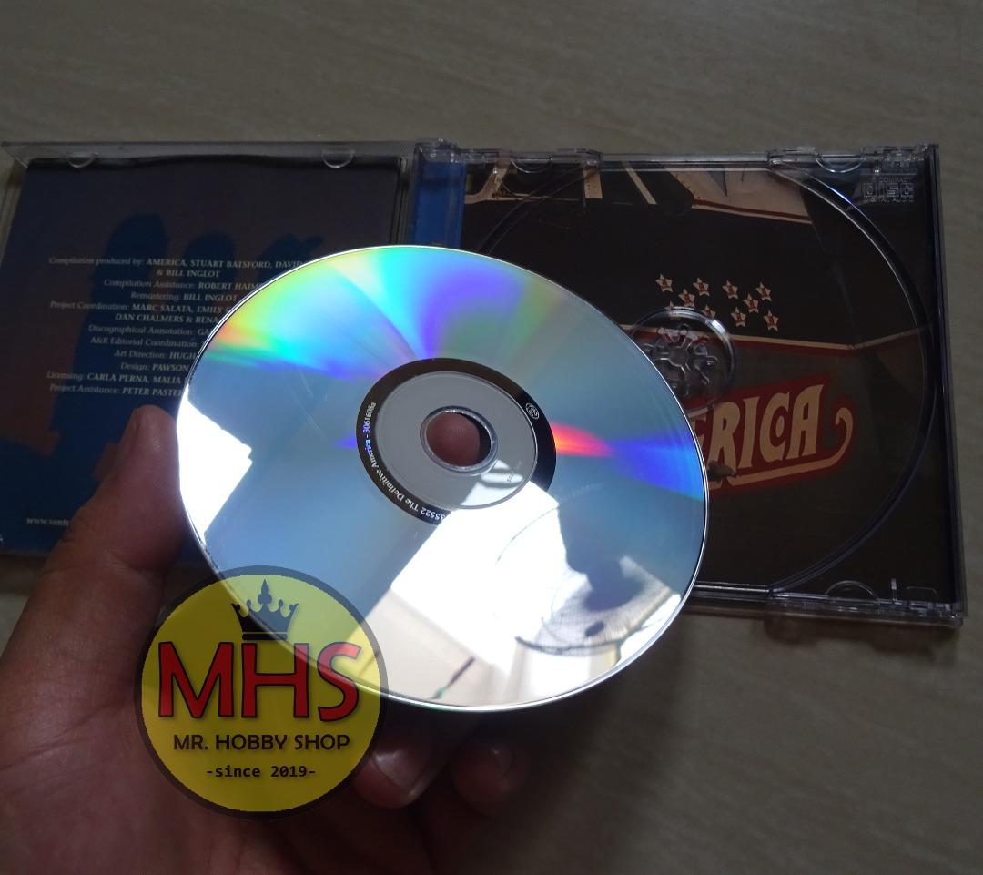 America The Definitive America CD (100M Original Copy), Hobbies & Toys