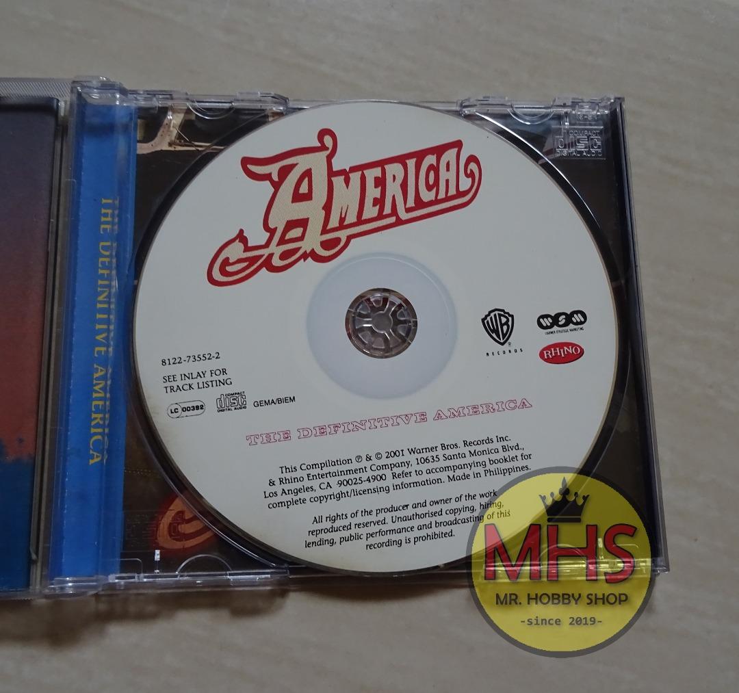 America The Definitive America CD (100M Original Copy), Hobbies & Toys