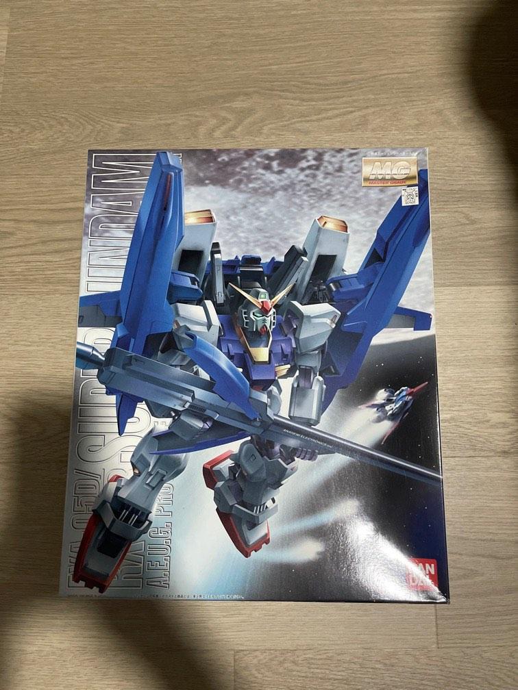 BANDAI Mg 714202 Super Gundam Rx-178+Fxa-05D 1/100 Scale Kit (Category: Gundam Model Kits) located in Singapore. Submitted by astrallight (Listing ID 1192577807, Image 1). Description: BANDAI Mg 714202 Super Gundam Rx-178+Fxa-05D 1/100 Scale Kit Opened but unbuilt .