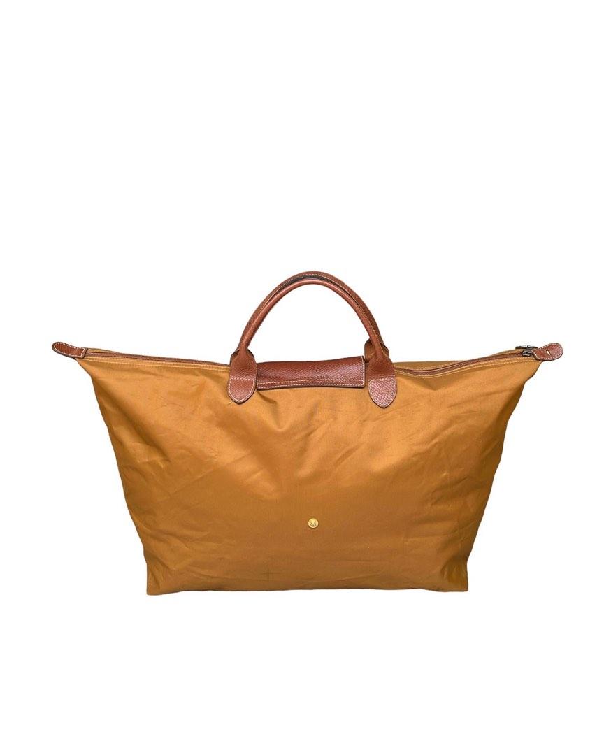 Longchamp travel bag Authentic, Barang Mewah, Tas & Dompet di Carousell