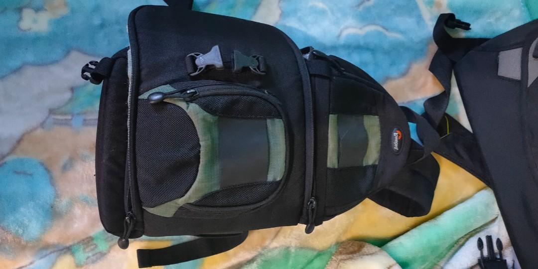 Lowepro slingshot 102 AW camera bag (Category: Cameras) located in Taguig. Submitted by petgals (Listing ID 1192640089, Image 3). Description: Fits D-SLR Camera 2-3 Lens Kit 600D Polyester and 1680D Nylon Fully Padded Interior Two Compartments Divider System Two Memory Card Pockets Attached Sling Shoulder Strap.