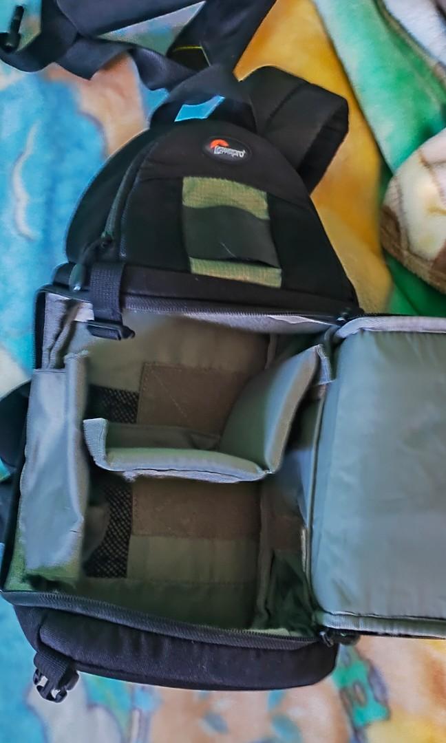 Lowepro slingshot 102 AW camera bag (Category: Cameras) located in Taguig. Submitted by petgals (Listing ID 1192640089, Image 2). Description: Fits D-SLR Camera 2-3 Lens Kit 600D Polyester and 1680D Nylon Fully Padded Interior Two Compartments Divider System Two Memory Card Pockets Attached Sling Shoulder Strap.