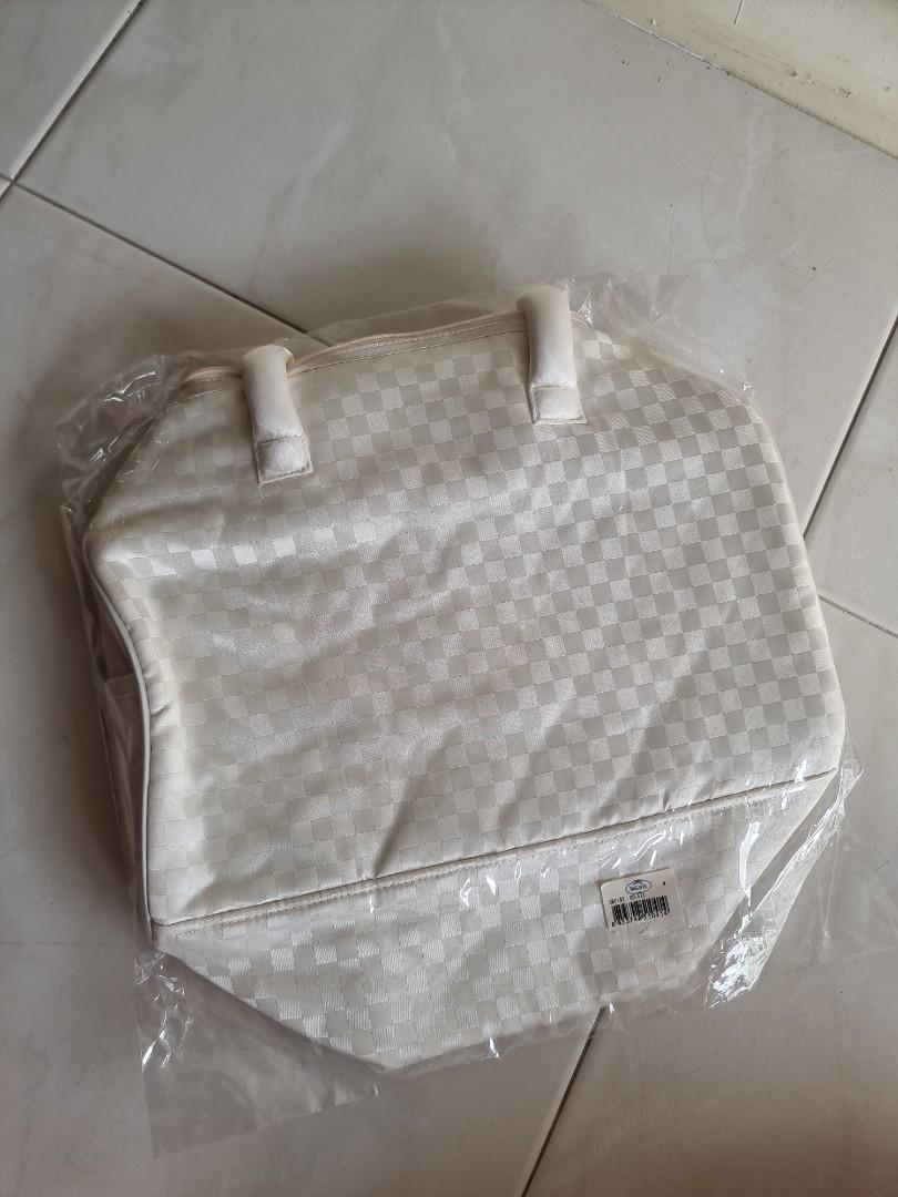 White and silver store bag