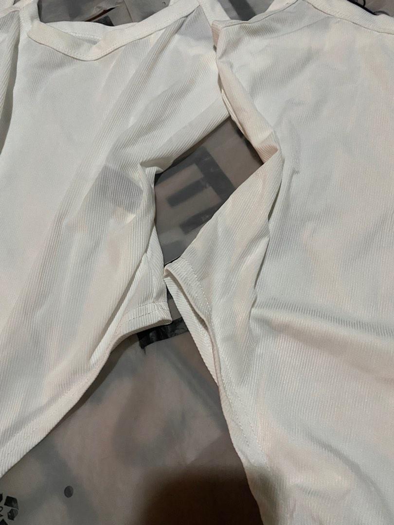 SHEIN White basic bodysuit!!!! Super basic. RIBBED QUALITY. (Category: Sleeveless) located in Quezon City. Submitted by hoftroy (Listing ID 1192546406, Image 2). Description: Ribbed quality but thin material Stretchy. I have 2 small 1 large SOLD.