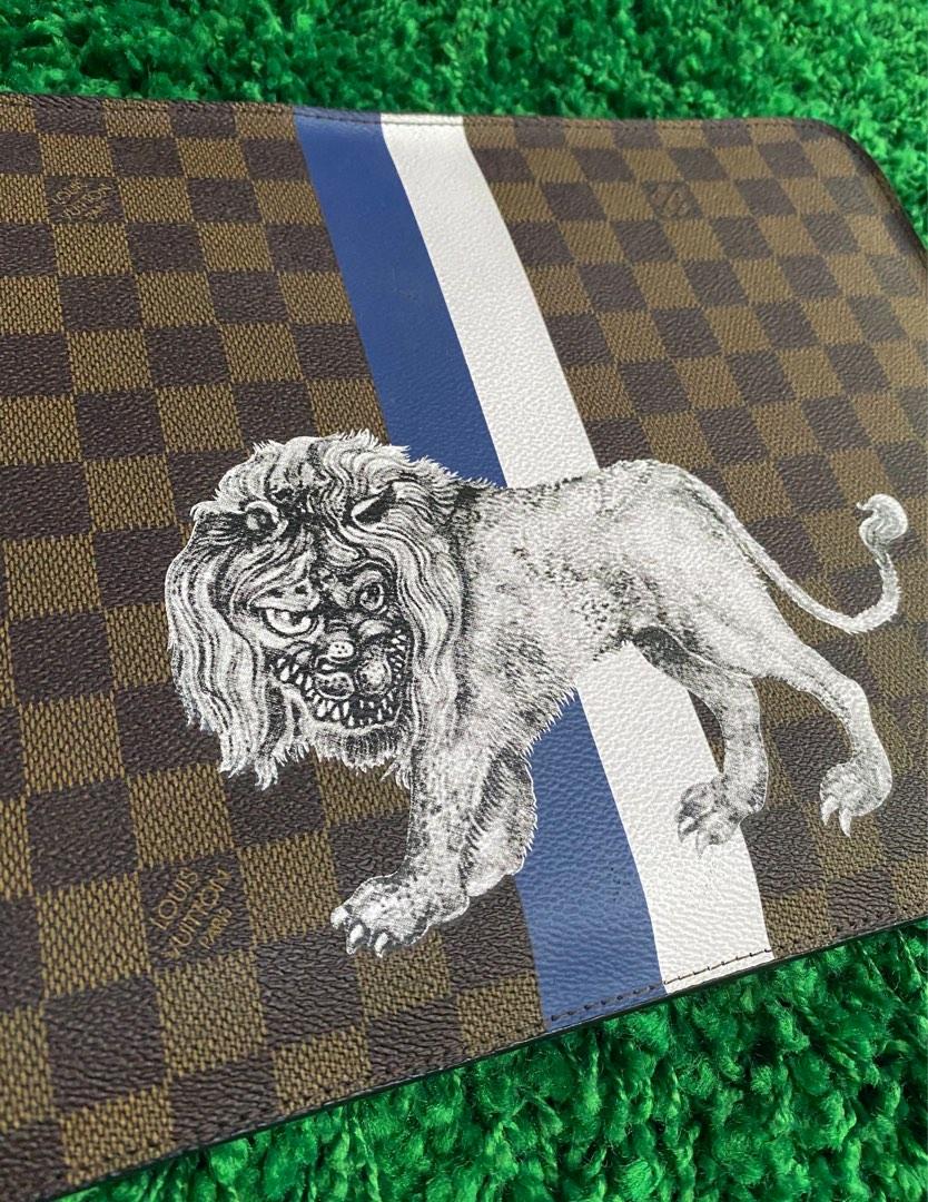 Louis vuitton lion pochette store