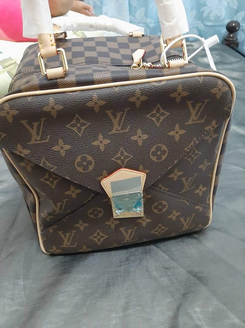 LV LOCK MONOGRAM (Category: Luxury Bags & Wallets) located in Lingayen. Submitted by maryjane20144delacruz (Listing ID 1192721754, Image 2). Description: selling my lv lock monogram, can be used as a travel bag since a bit big for an everyday bag..