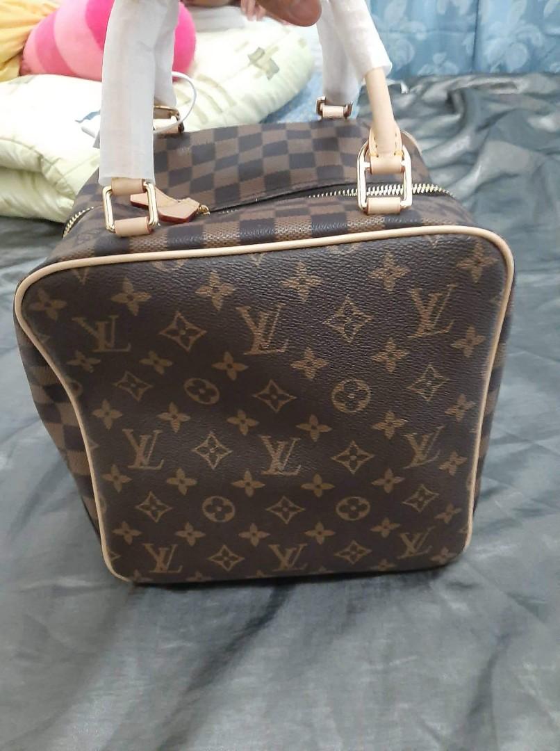 LV LOCK MONOGRAM (Category: Luxury Bags & Wallets) located in Lingayen. Submitted by maryjane20144delacruz (Listing ID 1192721754, Image 3). Description: selling my lv lock monogram, can be used as a travel bag since a bit big for an everyday bag..