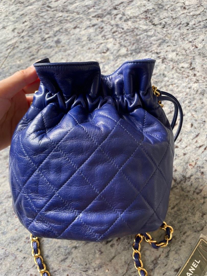 Vintage Chanel blue lambskin mini drawstring bucket bag, Luxury, Bags &  Wallets on Carousell