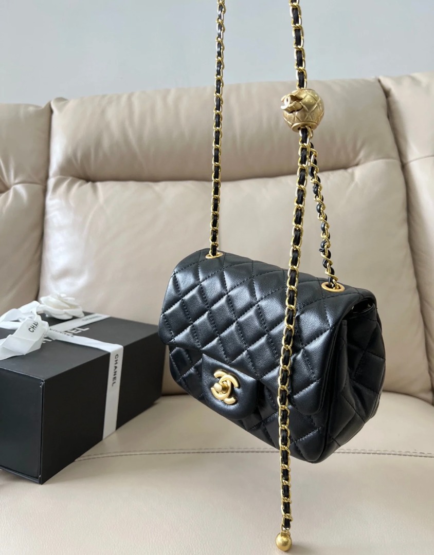 Gold ball handbag on sale