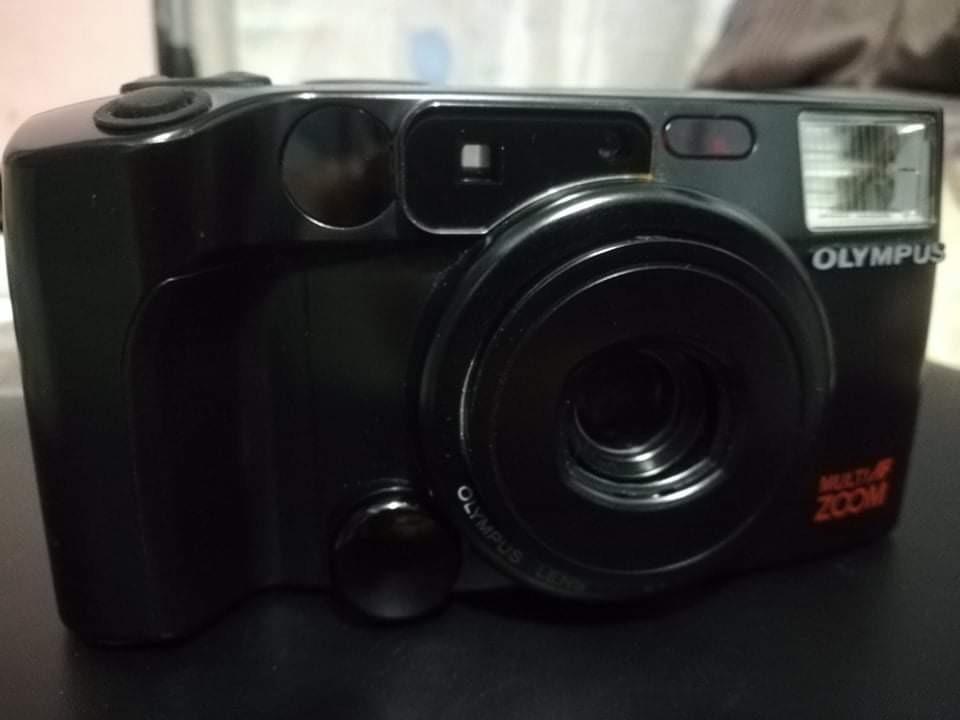 FILM CAMERA OLYMPUS MULTI AF ZOOM (Category: Cameras) located in San Pablo. Submitted by aquino.bren (Listing ID 1192990009, Image 1). Description: FILM CAMERA OLYMPUS MULTI AF ZOOM Php 2800 38-80mm Compact and easy to use In good working condition Cosmetics: 8/10 Normal signs of usage With strap and pouch Clean lens Clean VF Powered by 2pcs cr123a batteries PM for sample shots.