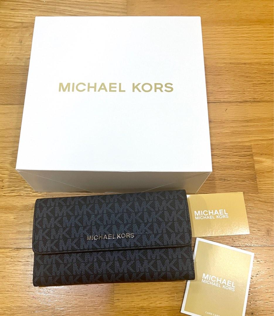 Michael Kors trifold wallet (Category: Luxury Bags & Wallets) located in Makati City. Submitted by copcor (Listing ID 1192923694, Image 2). Description: Brand new Michael Kors trifold blue wallet .