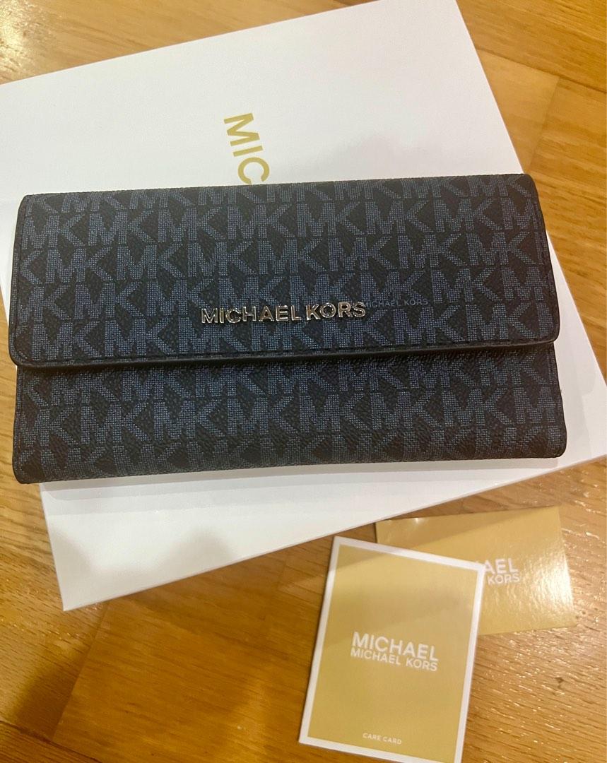 Michael Kors trifold wallet (Category: Luxury Bags & Wallets) located in Makati City. Submitted by copcor (Listing ID 1192923694, Image 3). Description: Brand new Michael Kors trifold blue wallet .