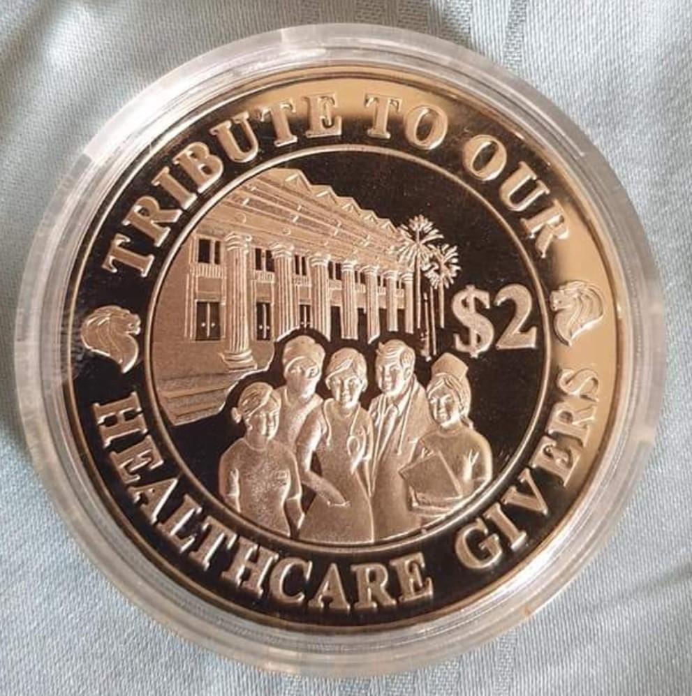 Rare Singapore $2 coin. In pristine condition., Hobbies & Toys, Memorabilia  & Collectibles, Currency on Carousell