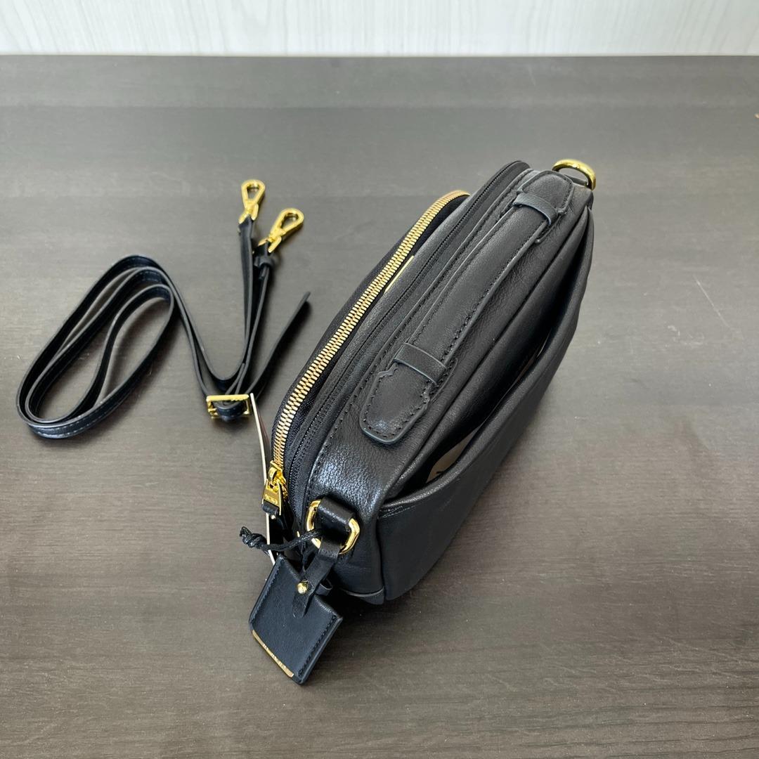 TUMI Marcie Crossbody Leather, Luxury, Bags & Wallets on Carousell