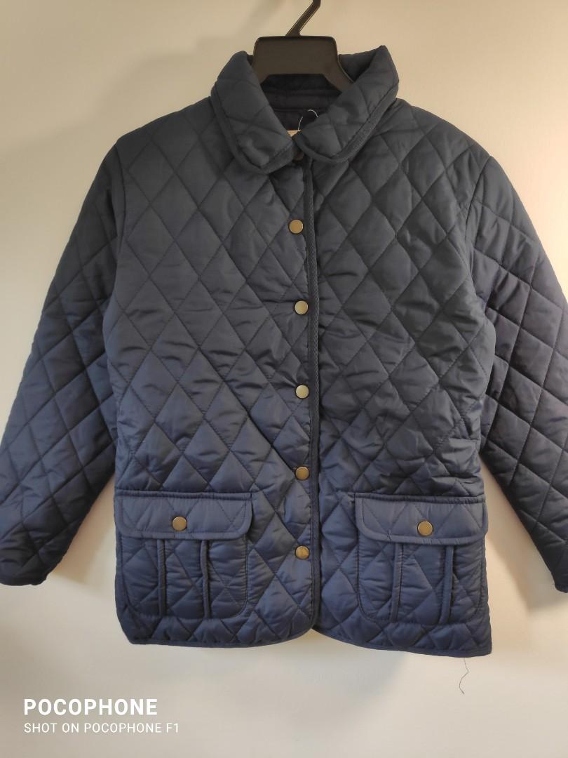 Winter Jacket (Category: Coats, Jackets and Outerwear) located in Singapore. Submitted by bamboo4rest (Listing ID 1192840424, Image 1). Description: Brand new with tag. A navy blue fully lined quilted jacket. Snap button front closure and 2 front flap pocket with snap button. Size 12 to 13 years old. Can fit a petite size adult. Measurements Chest 48cm Shoulder 40cm Sleeve 50cm Length 60cm Contact me if you are interested.
