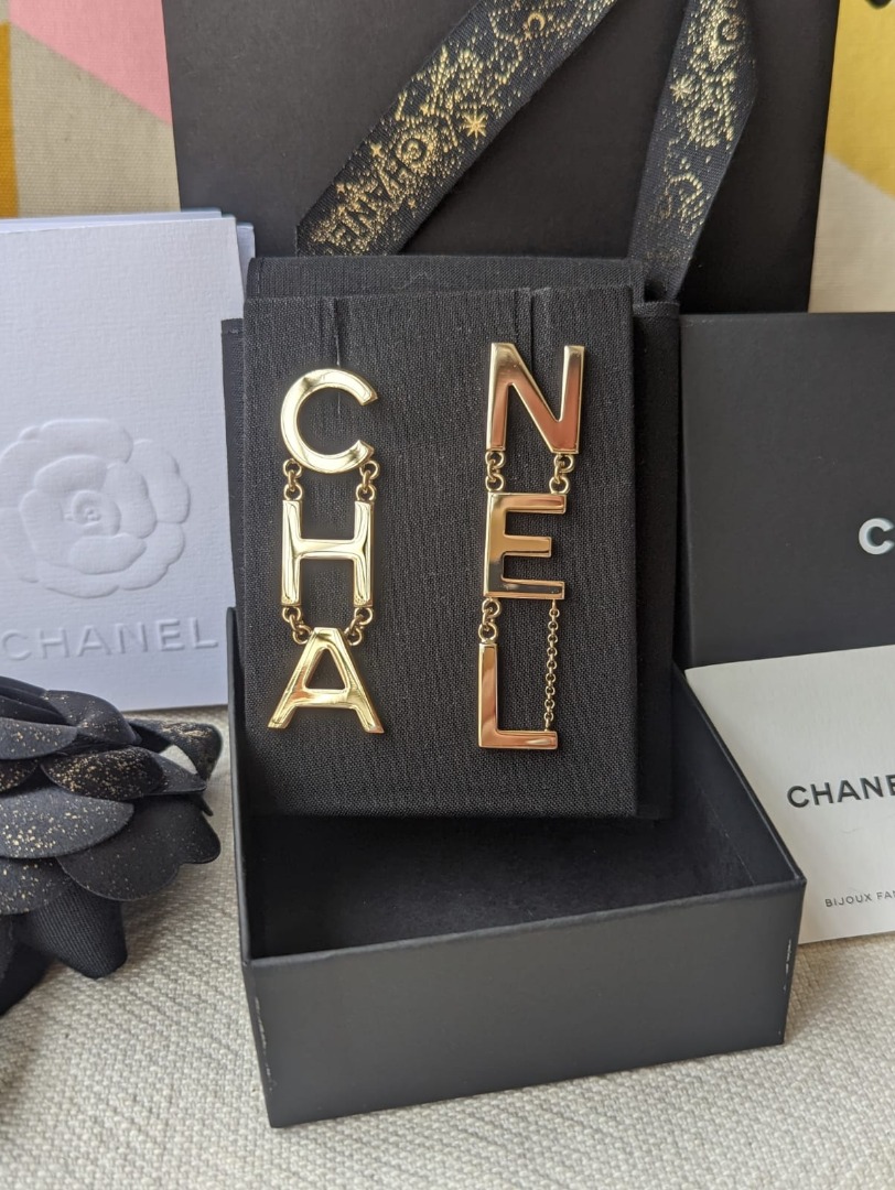 Chanel large silver metal CC logo crystals earrings