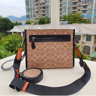 Coach clutch bag 2025 malaysia