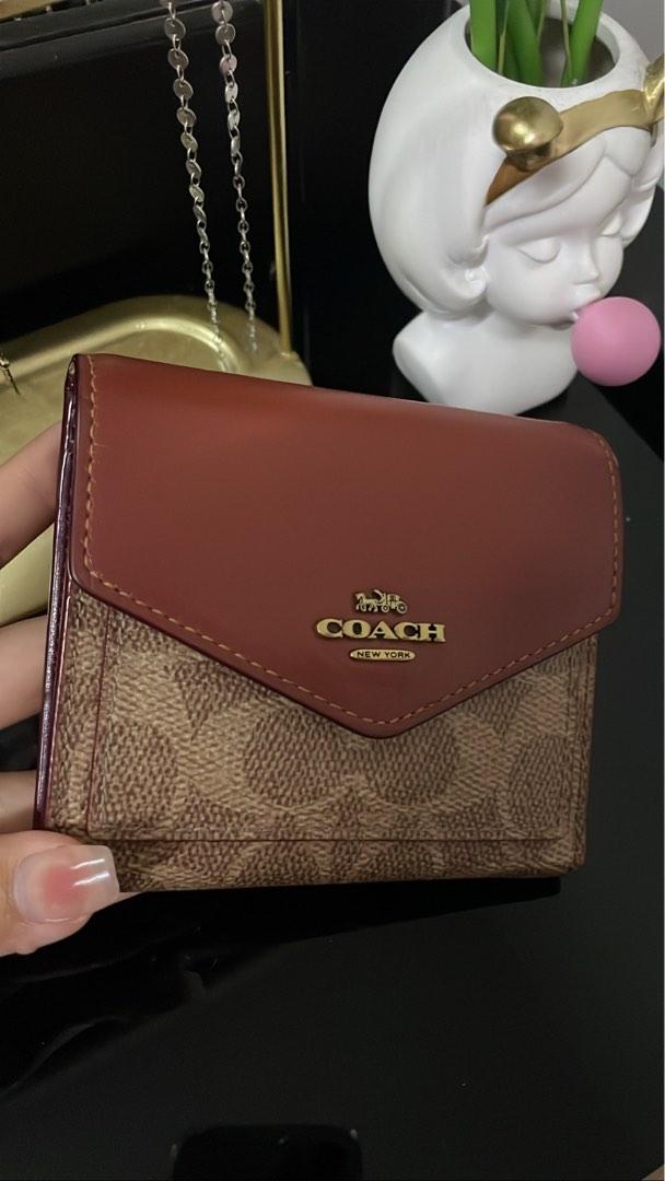 Coach hotsell wallet sales