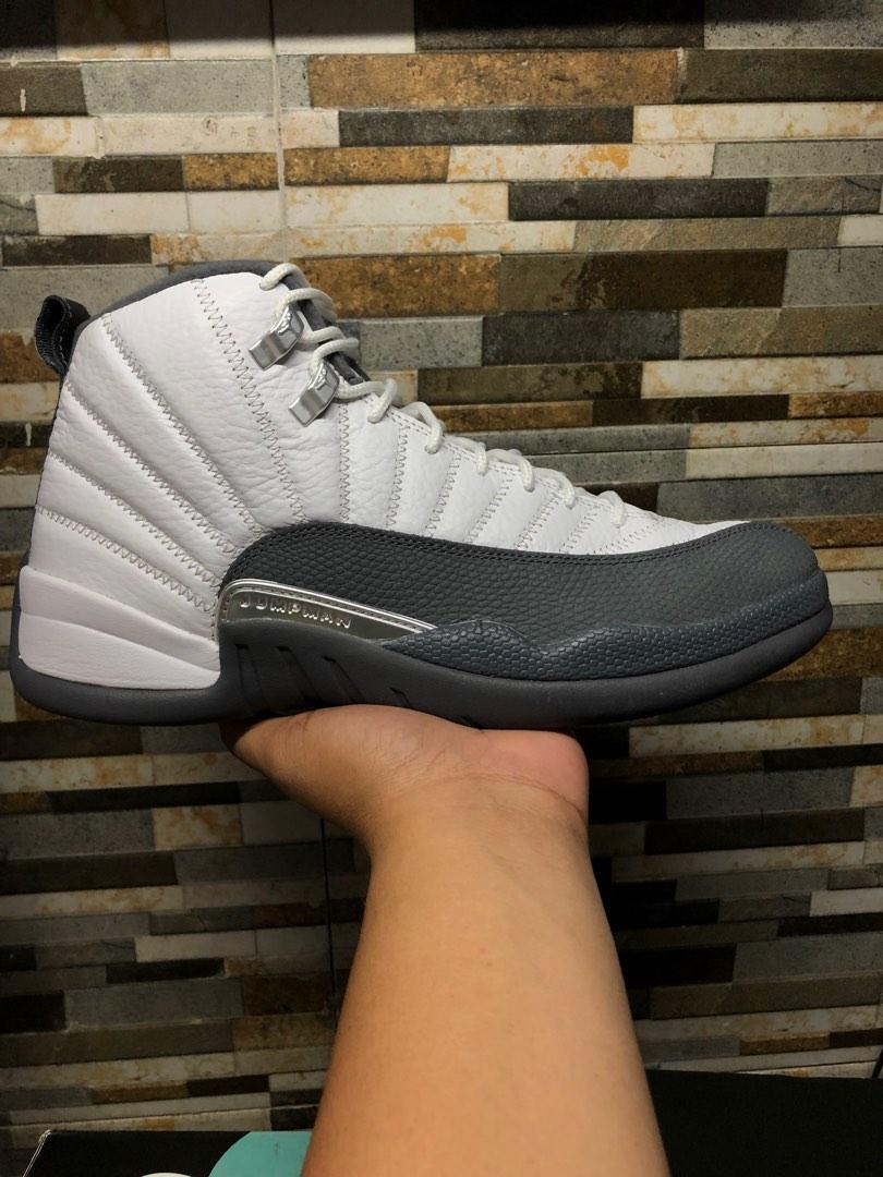 gray and white 12 jordans