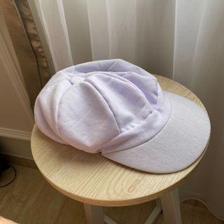 Topi putih apolo pelukis