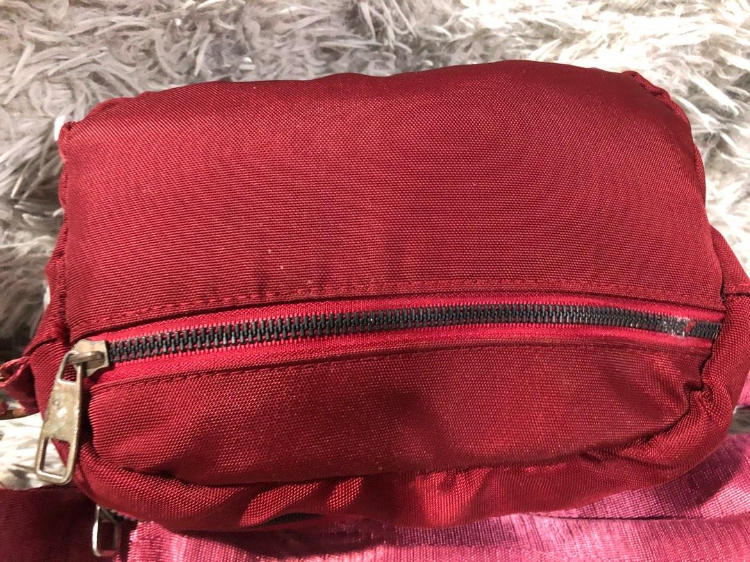 YSL crossbody bag (Category: Luxury Bags & Wallets) located in Angono. Submitted by fhlor02 (Listing ID 1193385929, Image 3). Description: YSL crossbody bag, maroon nylon material, fashion bag only, no etiketa or code inside, small to medium in size, has three compartment.