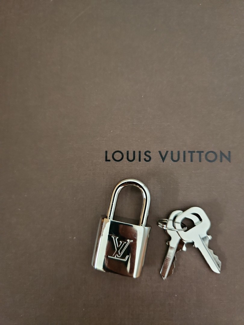 Silver Louis Vuitton 'Lock & Key' Cufflinks, Luxury, Accessories on  Carousell