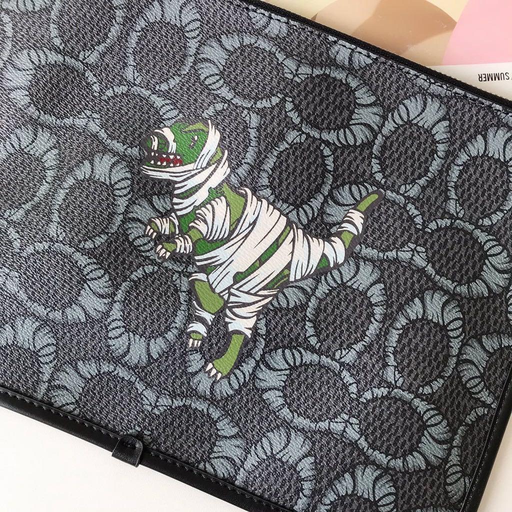 Coach rexy clutch best sale
