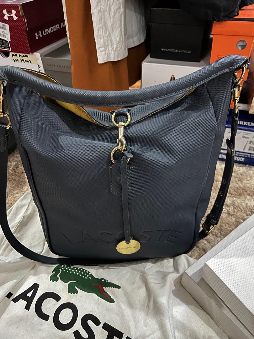 Lacoste Hobo bag with sling (Category: Cross-body Bags) located in Imus. Submitted by Bagshoeshop (Listing ID 1193475463, Image 2). Description: *Pre-Loved *lacoste *no issue *decluttering.