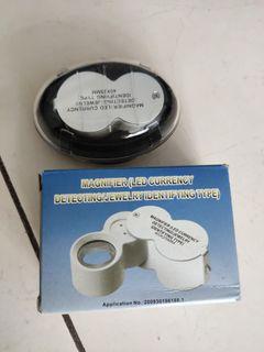 Small magnifier for currency or jewellery (defective UV and  white light)