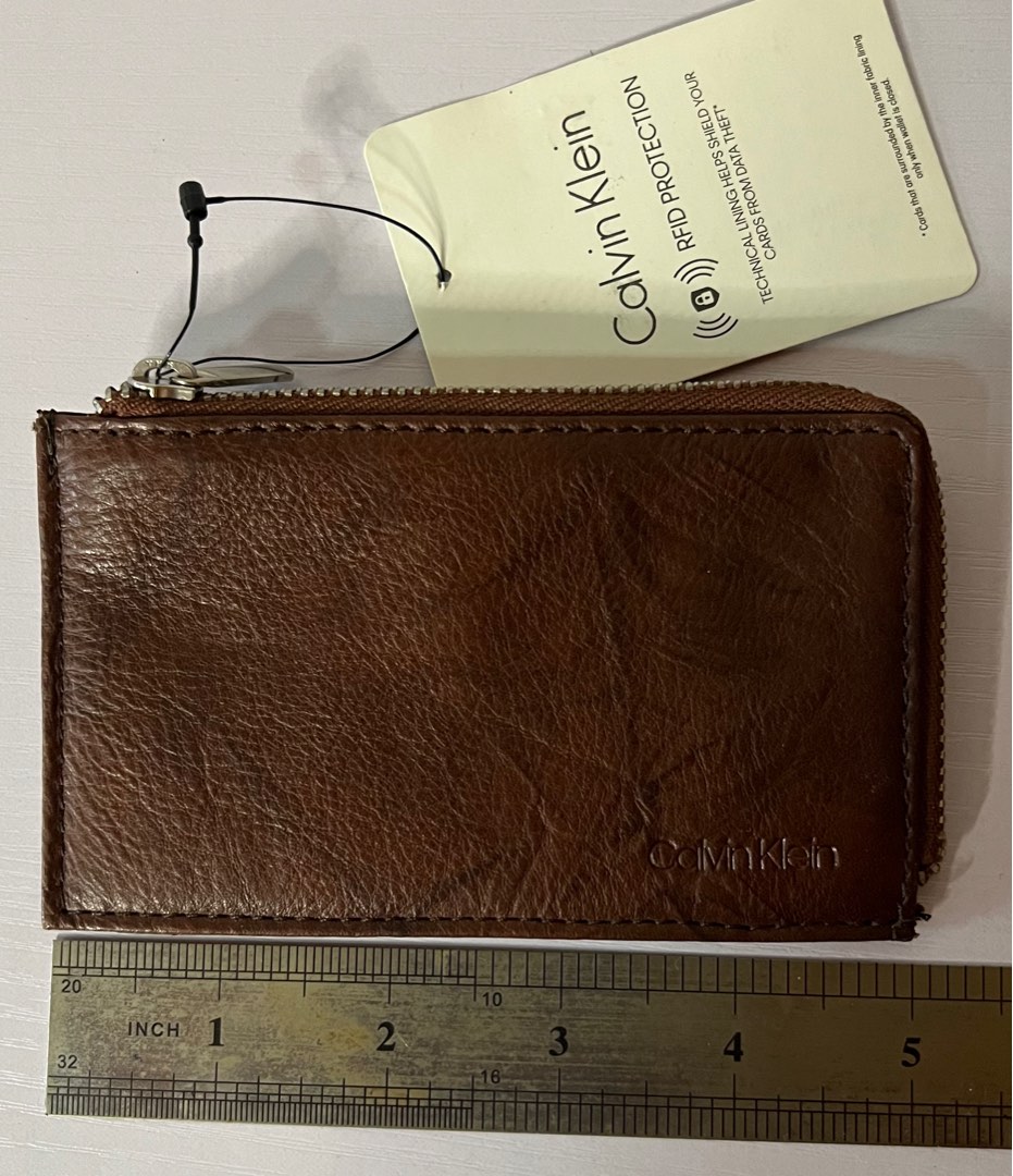 Calvin Klein unisex coin/card holder, Women's Fashion, Bags & Wallets
