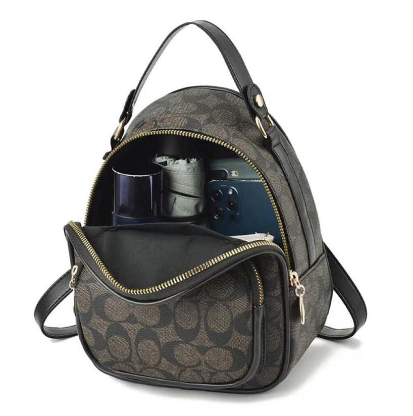 Coach sling hotsell backpacks
